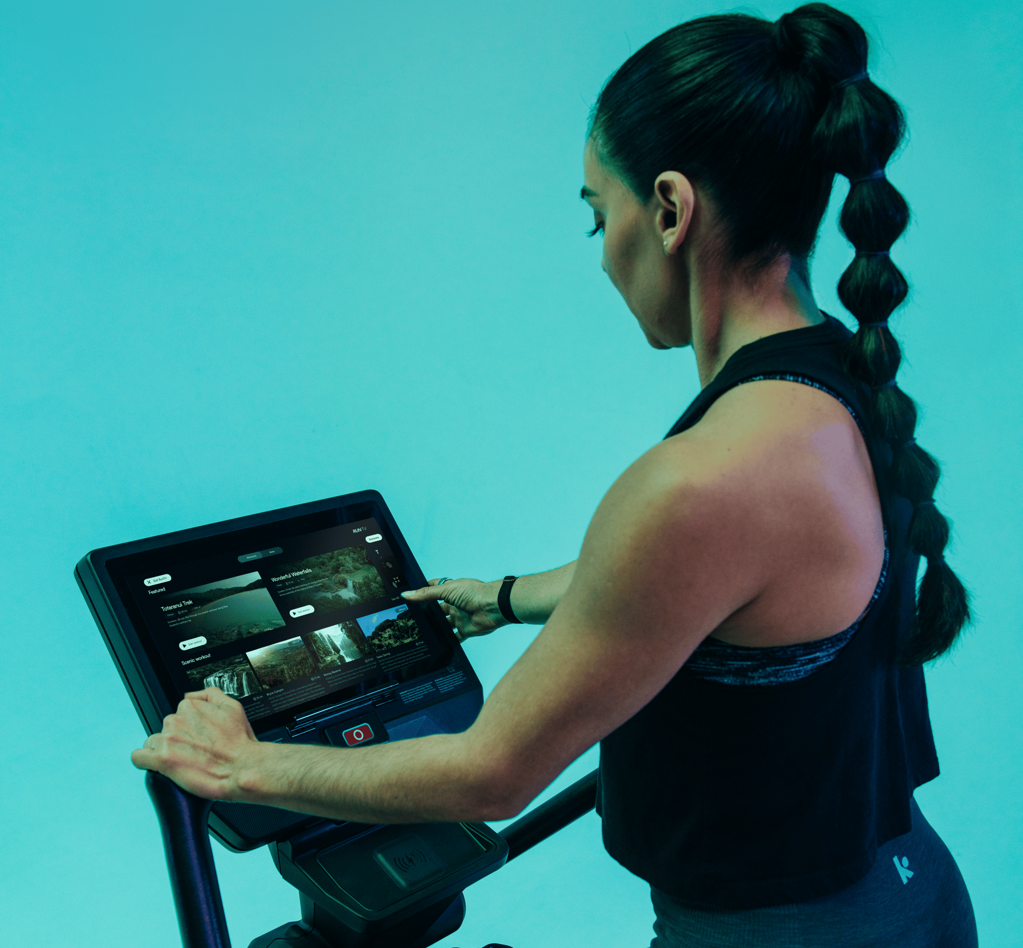 StairMaster 8Gx with Touchscreen and Woman Interacting with the Screen. StairMaster 8Gx with Touchscreen and Woman Interacting with the Screen.